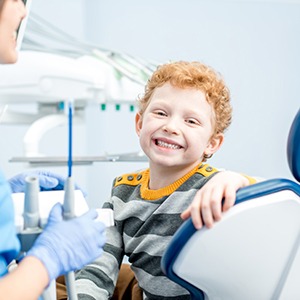 Little boy smiling in the dentist’s chair